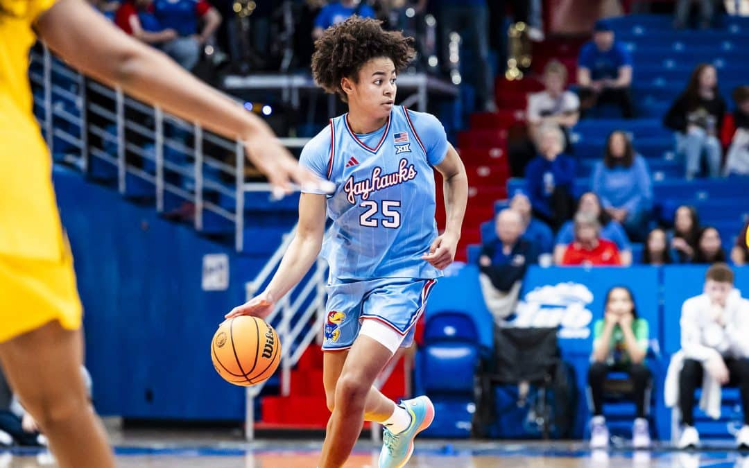 Davis Scores 21 in Return; Jayhawks Fall to Mountaineers